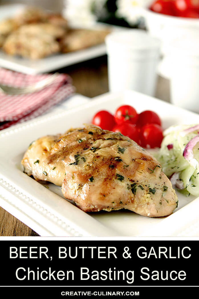Beer, Butter, and Garlic Chicken Basting Sauce on Chicken Thighs Garnished with Herbs Served with Cherry Tomatoes