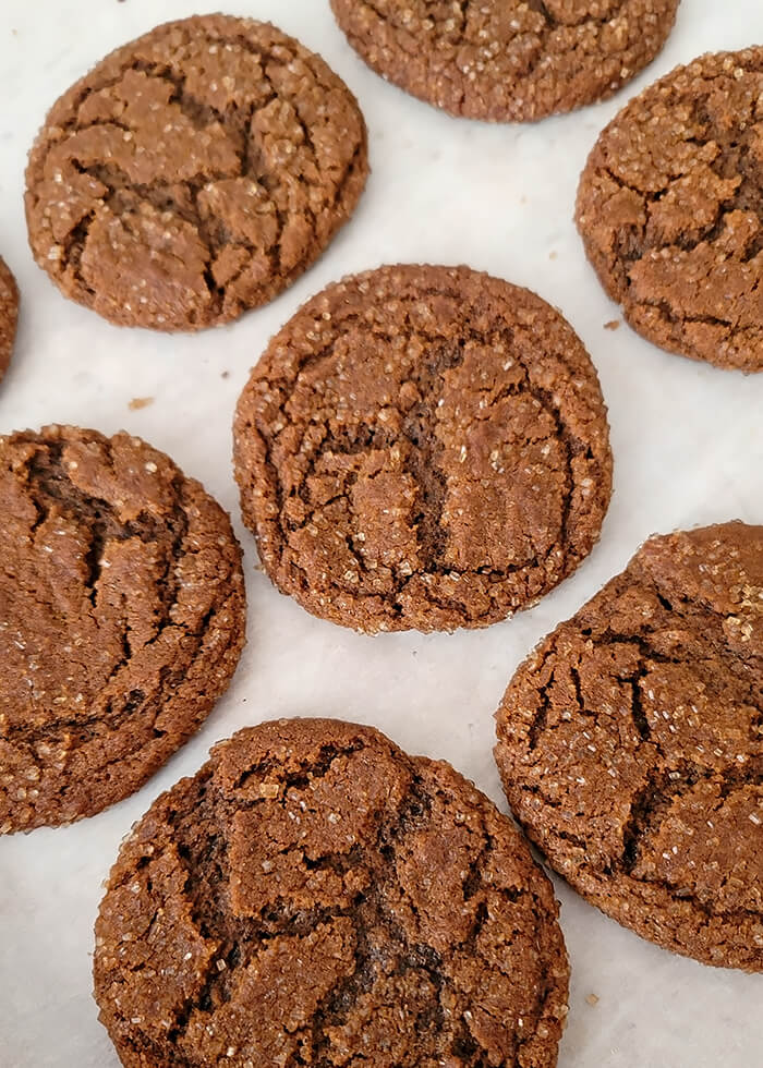 Molasses Cookies on Parchment Paper after Baking
