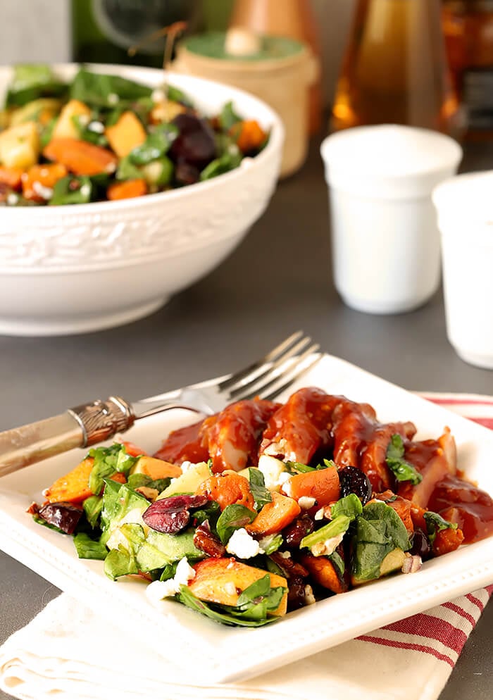 Sweet Potato and Spinach Salad with Pecans, Cherries and Goat Cheese Served with Barbecued Smoked Chicken on a Square Plate