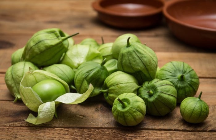 Tomatillos in Husks on Table