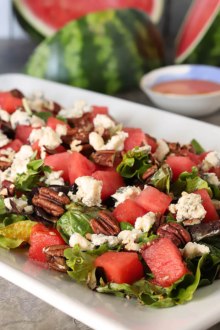 Watermelon Pecan Salad with Gorgonzola Cheese on a Platter
