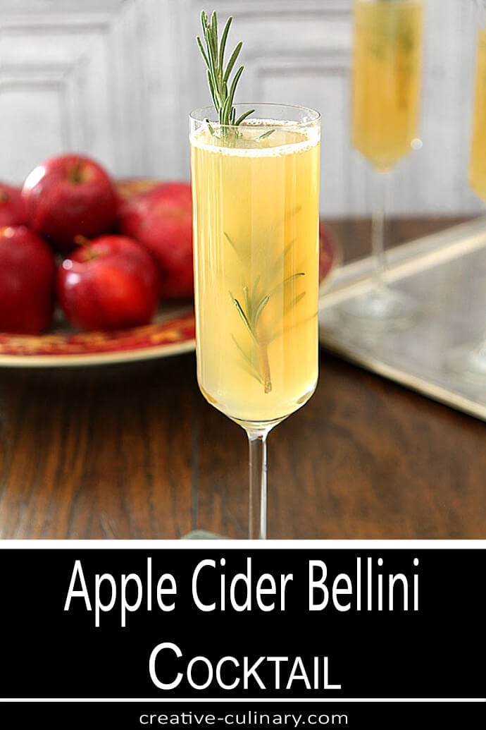 One Glass of Apple Cider Bellini Cocktail Garnished with Rosemary