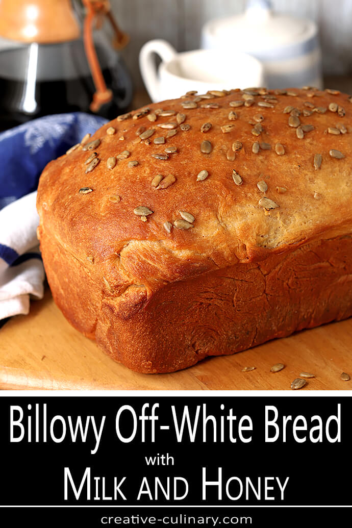 Loaf of Billowy Off-White Bread with Sunflower Seeds