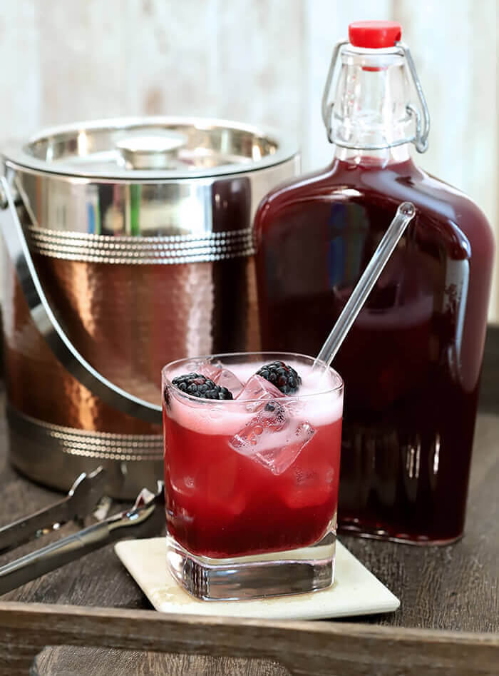 Homemade Crème de Mûre Homemade Crème de Mûre (Blackberry Liqueur) Served with Prosecco and fresh blackberries.