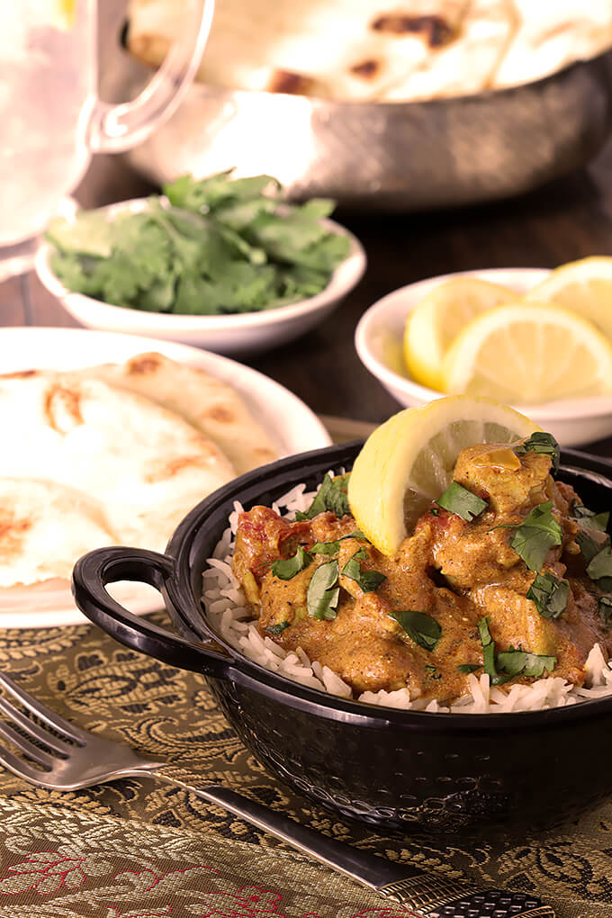 Easy Chicken Curry Garnished with Lemon