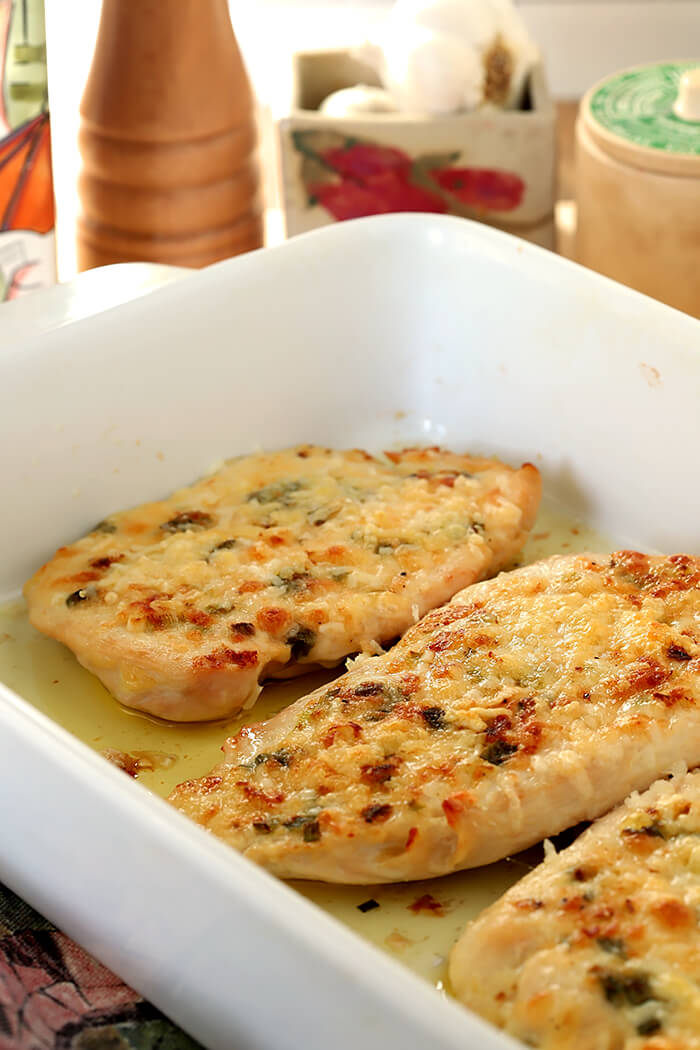 Broiled Chicken Parmesan with Green Onion Garnish