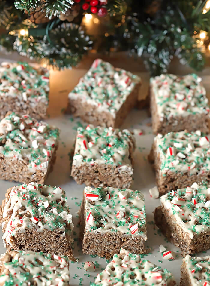 Two Chocolate Mint Rice Krispie Treats Drizzled with White Chocolate Frosting