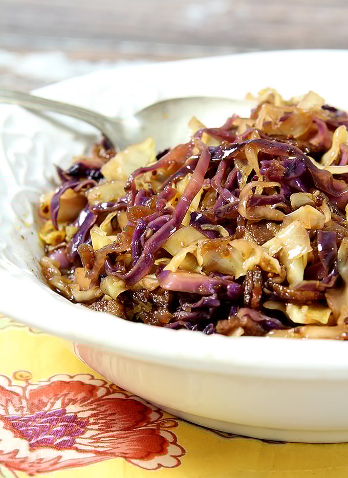Coleslaw with Warm Bacon Dressing Served in a White Bowl