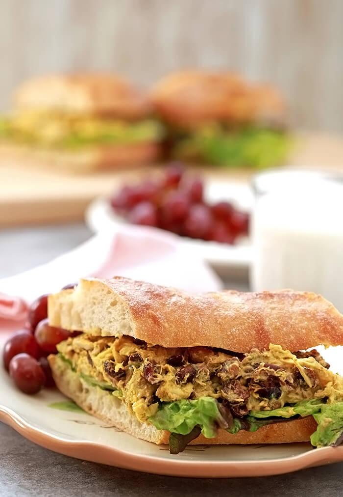 Curry Chicken Salad Curry Chicken Salad with Dried Cranberries and Walnuts on a Salad Plate