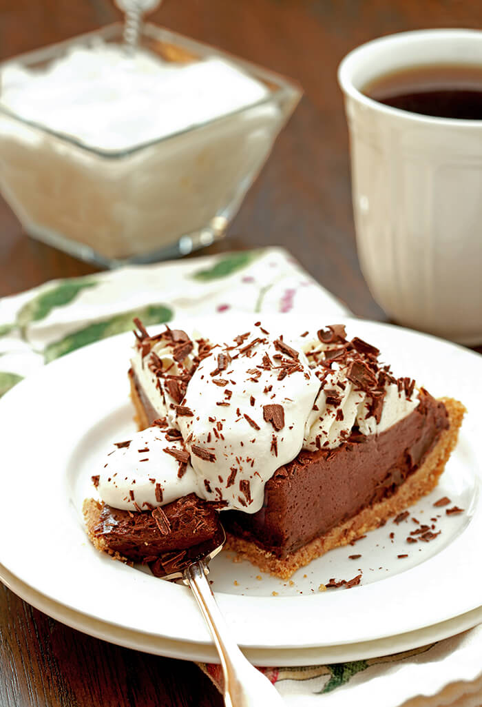 French Silk Pie with Bourbon with extra whipped cream and chocolate curls.