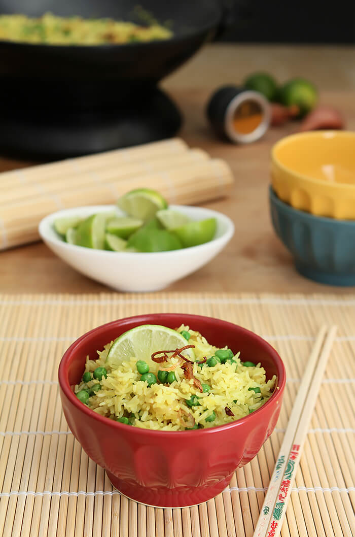 Crispy Shallots Fried Rice in Wok in Red Bowl with Lime Garnish