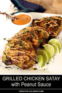 Grilled Chicken Thighs with Peanut Sauce on Serving Plate with Lime Wedges