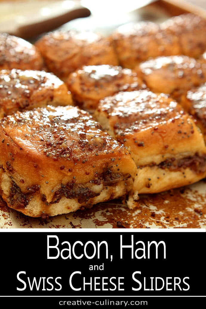 Bacon, Ham and Swiss Cheese Sliders on a Baking Tray for Serving