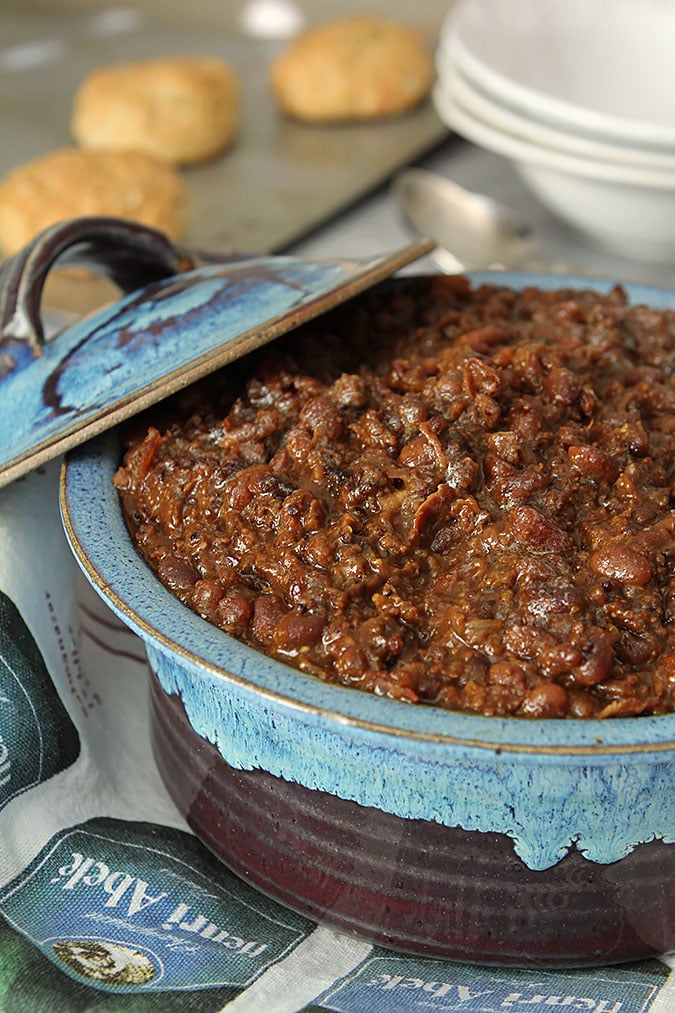 Hamburger Baked Bean Casserole Hamburger Baked Bean Casserole Served in a blue and burgundy pottery container.