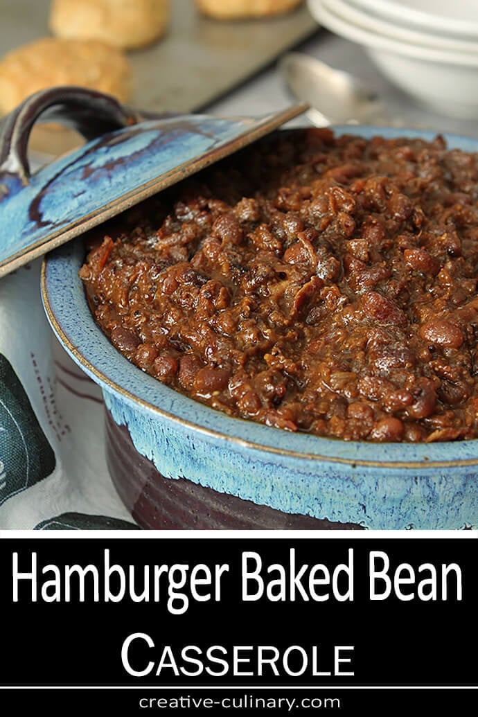 Hamburger Baked Bean Casserole Served in a Blue Pottery Dish