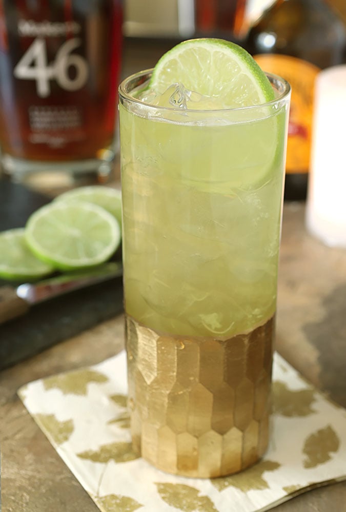 Honey Ginger Fizz Cocktail Honey Ginger Fizz Cocktail closeup of cocktail with a lime slice.