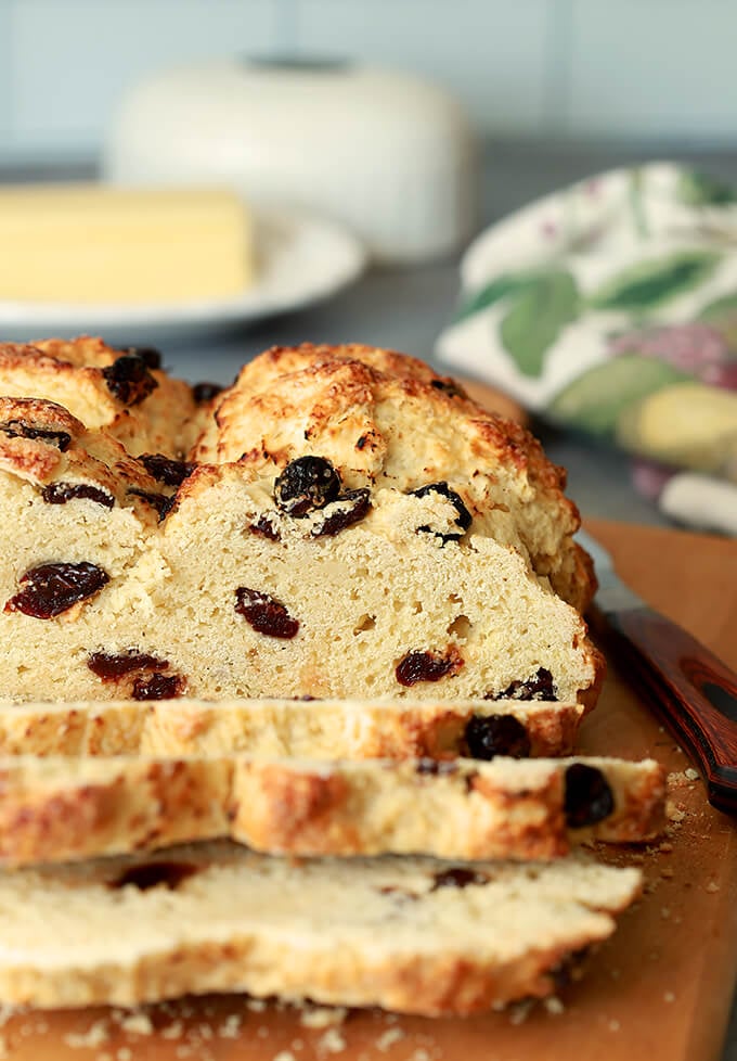 Irish Soda Bread with Tart Cherries Sliced on Bread Board