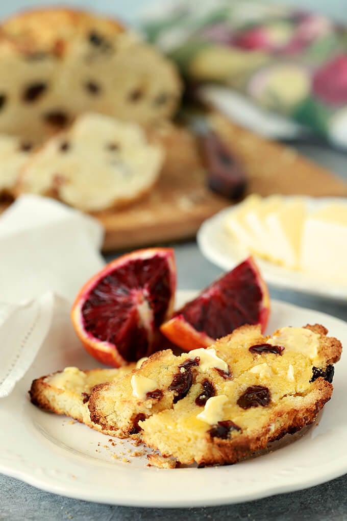 Irish Soda Bread with Tart Cherries Served on a Plate with Blood Oranges.