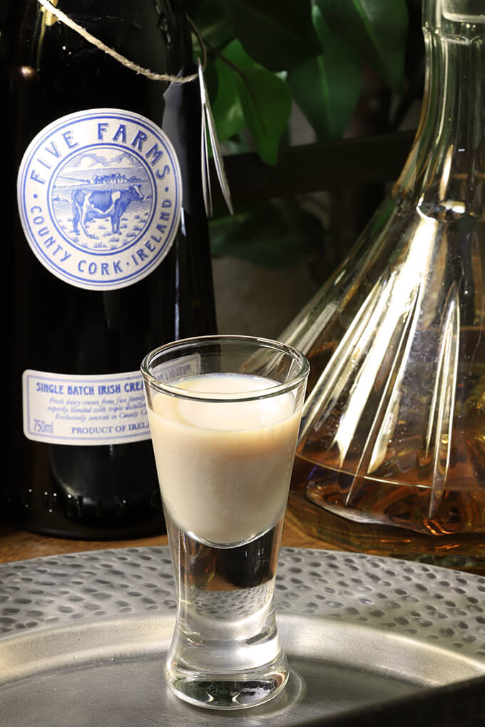 The Irish Toast - Irish Cream with Irish Whiskey Cocktail The Irish Toast Cocktail with Irish Whiskey and Five Farms Irish Cream with Bottles of Irish Cream and Irish Whiskey