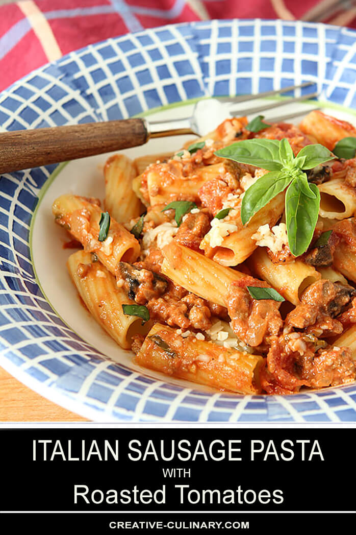 Italian Sausage Pasta with Roasted Tomatoes and Vodka Cream Served in Blue and White Pasta Bowl