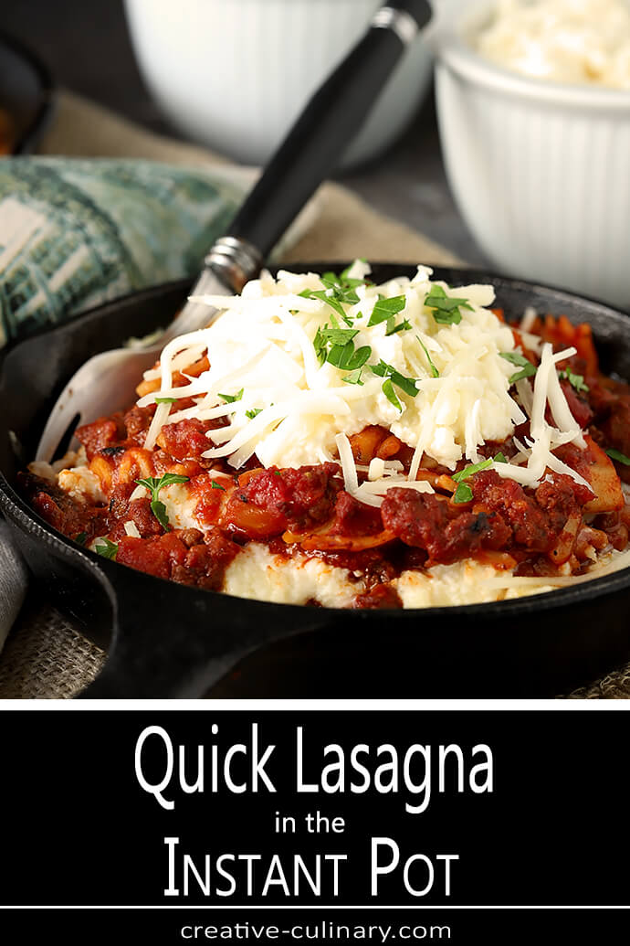 Mini Skillet of Easy and Cheesy Lasagna Topped with a Mixture of Three Cheeses