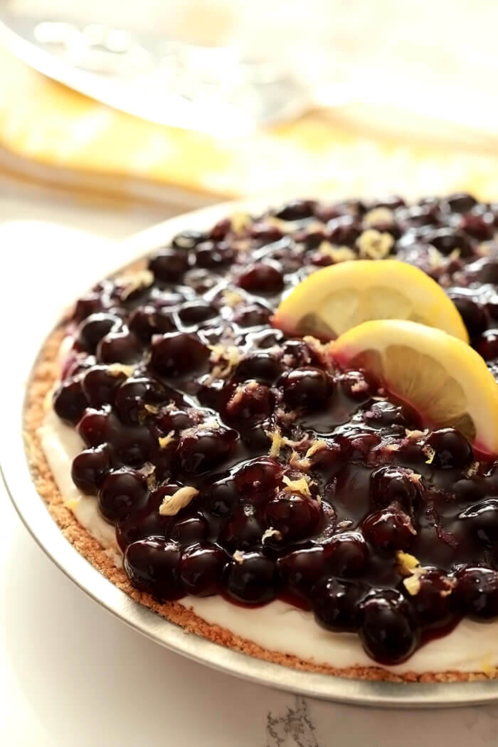 Lemon Cream Pie with Blueberries Whole with Lemon Slice Garnish