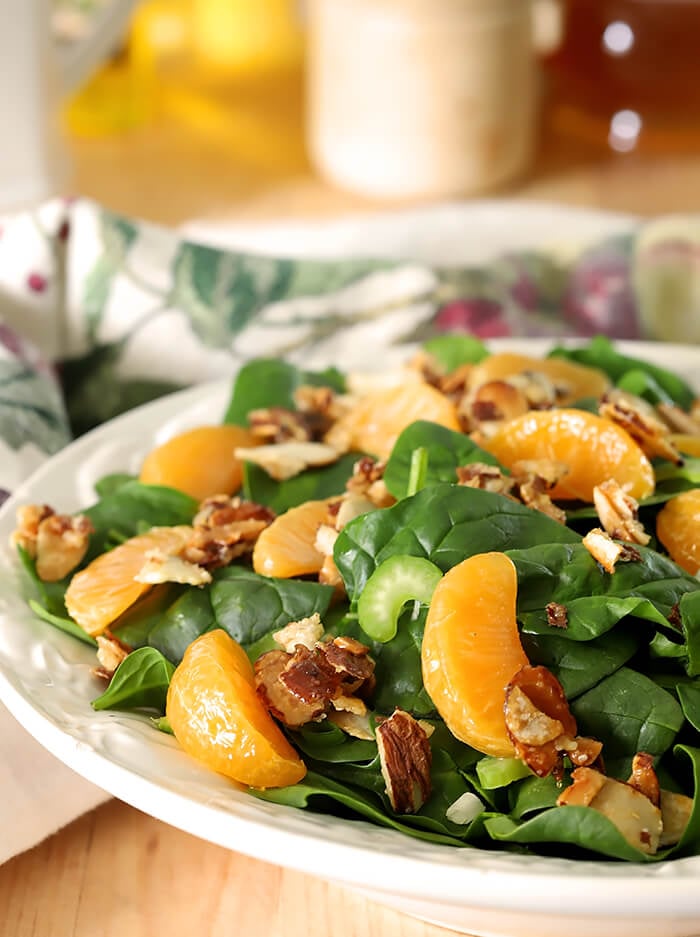 Mandarin Orange Salad with Candied Almonds Served on White Plate
