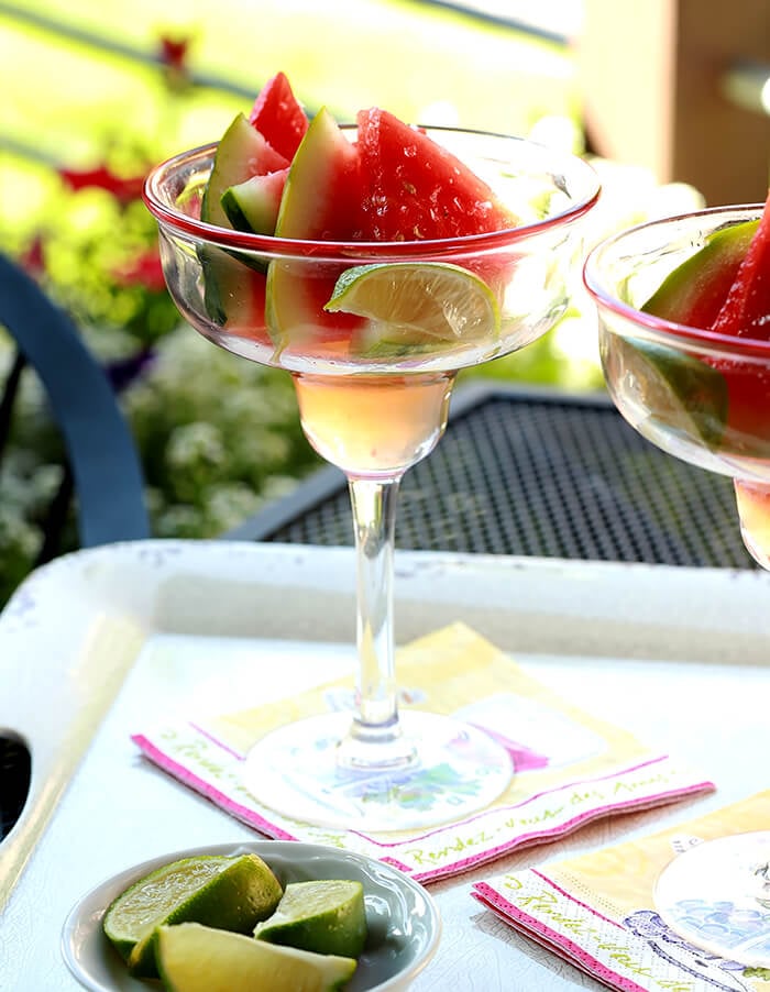 Margarita Watermelon Slices Served in a Margarita Glass on a Tray Outdoors