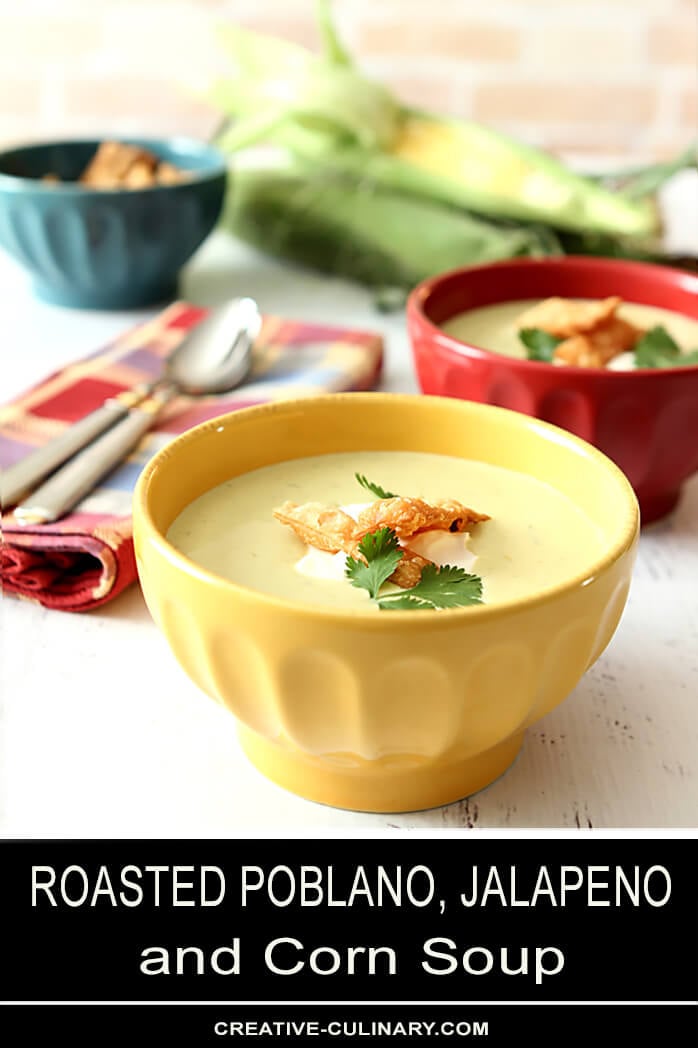 Roasted Poblano Pepper and Corn Soup in Yellow Bowl Garnished with Tortilla Strips