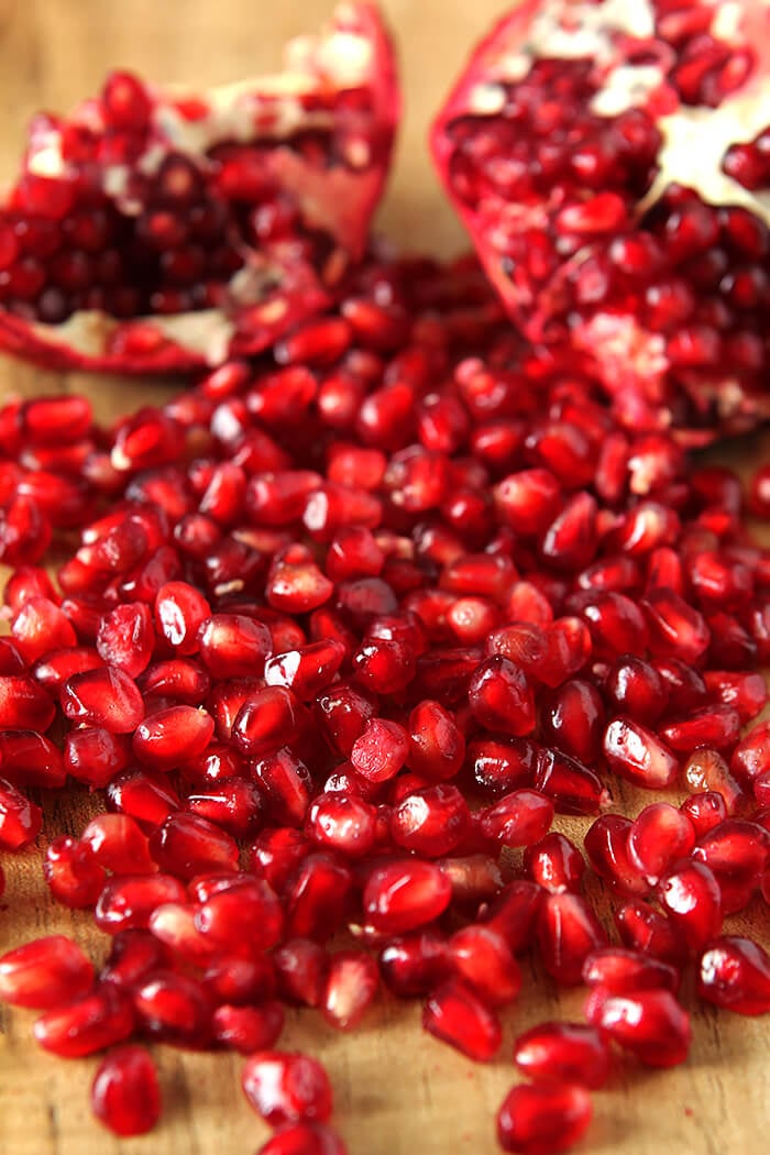 How to Seed A Pomegranate with Arils on Table