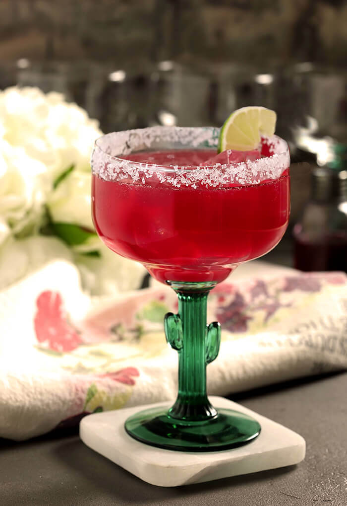 Prickly Pear Cactus Margarita in a Margarita Glass with a Cactus Stem