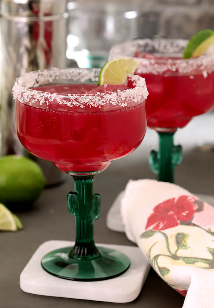 Prickly Pear Margaritas Garnished with Lime Wedge