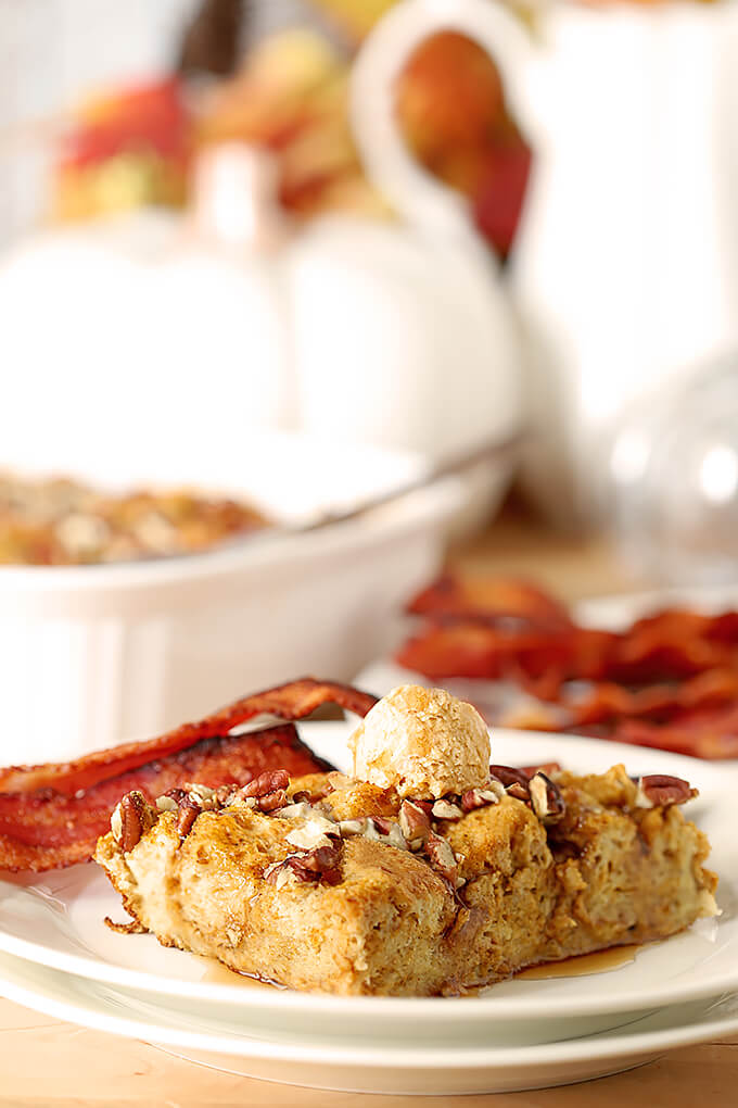 Pumpkin Pecan Overnight French Toast with Bourbon Pumpkin Pecan Overnight French Toast with Bourbon Served on White Plate with Pumpkin Butter and Maple Syrup