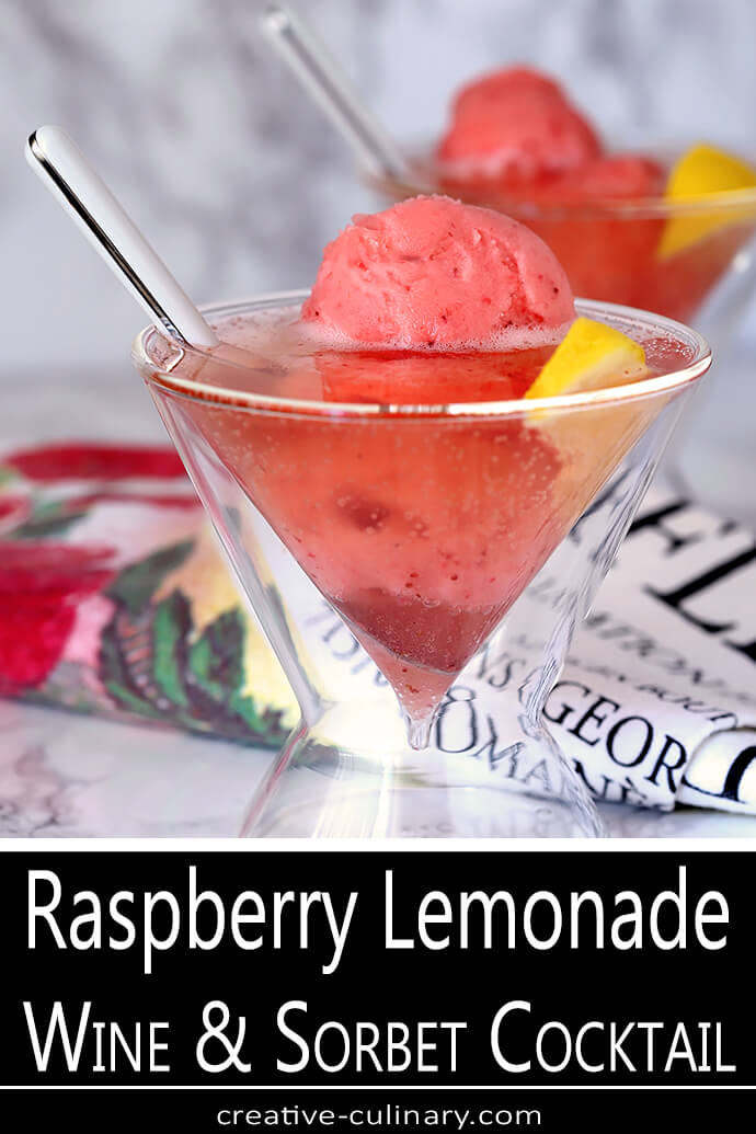 Raspberry Lemonade Wine with Strawberry Sherbet Served in a Martini Glass and Garnished with Lemon