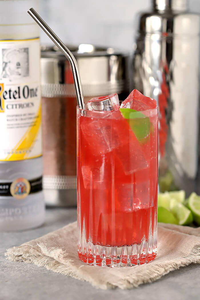 Raspberry Lime Vodka Soda Garnished with Lime Wedge