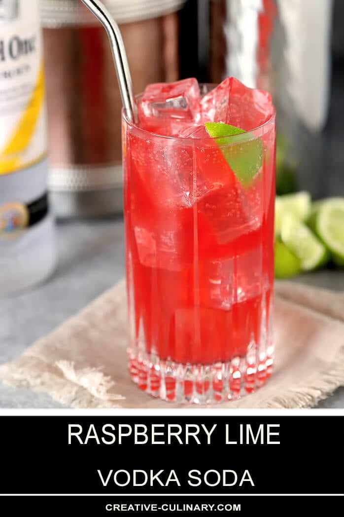 Raspberry Lime Vodka with Straw and Lime Wedge