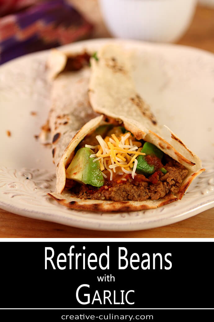 Refried Beans with Garlic in a Tortilla Wrap with Salsa, Avocado, and Cheese