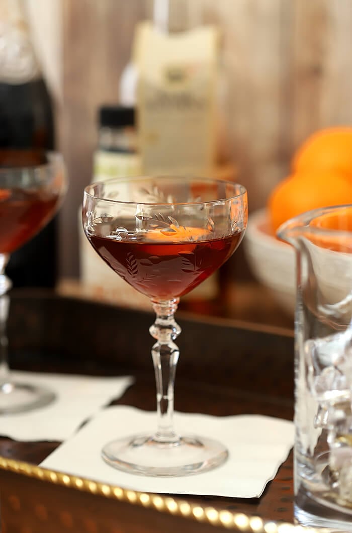 The Revolver Cocktail is a simple mixture of bourbon and coffee liqueur with an orange twist.