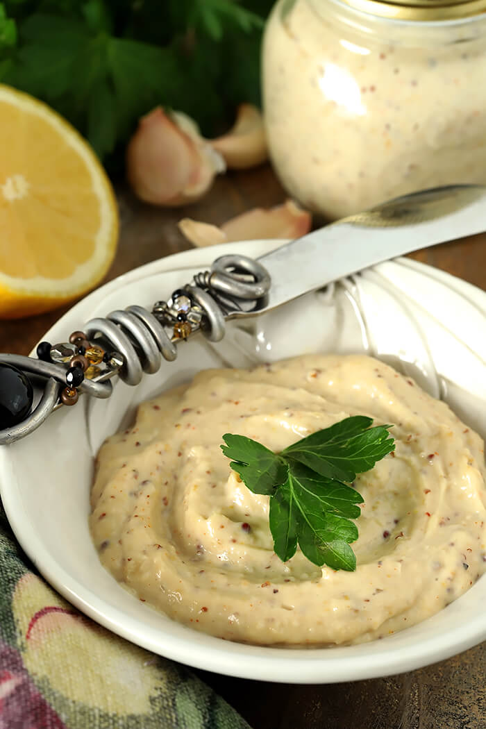Roasted Garlic Aioli in Dressing Dish with Decorated Knife