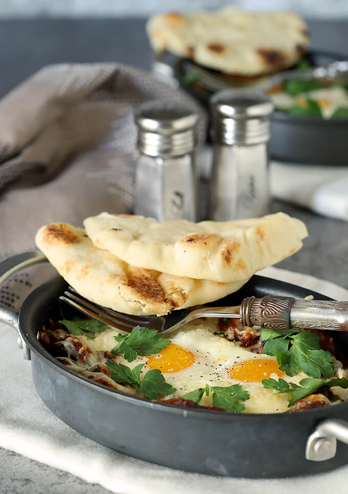 Shakshuka with Zucchini and Mushrooms Served in Skillet