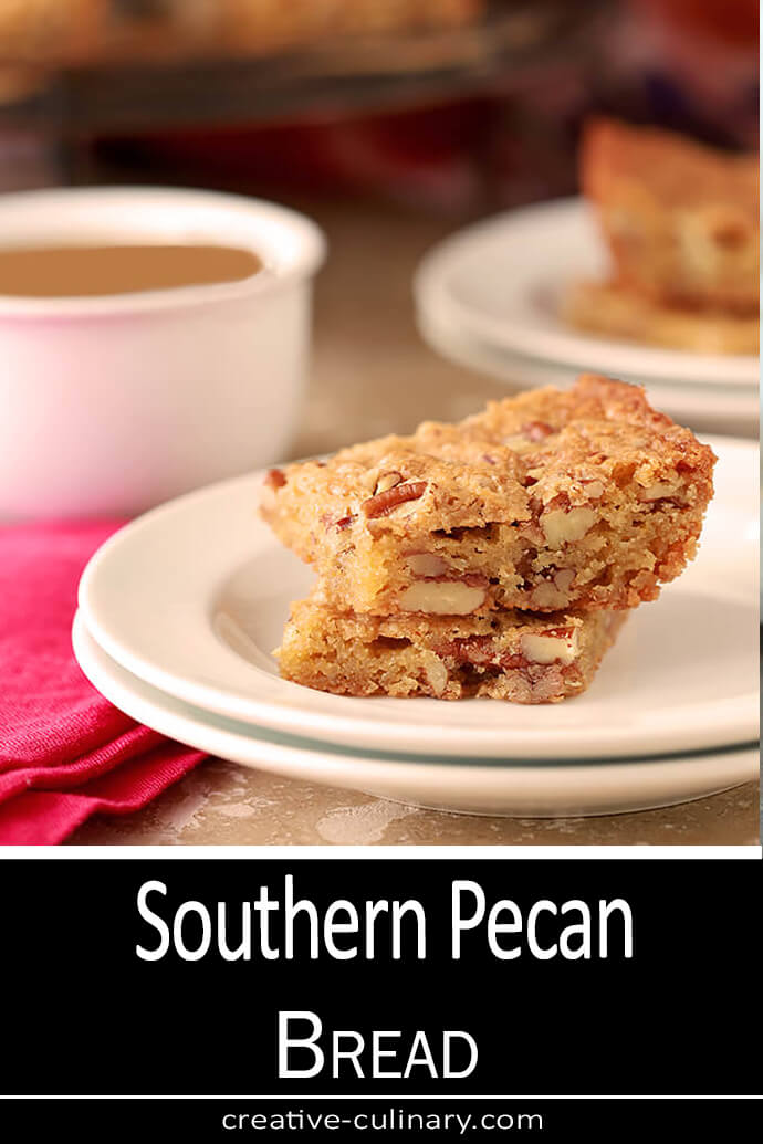 Southern Pecan Bread slices served on a white plate with a cup of coffee.