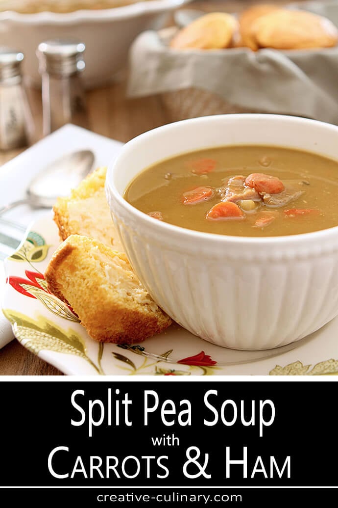 Split Pea Soup with Carrots and Ham Served in a White Bowl