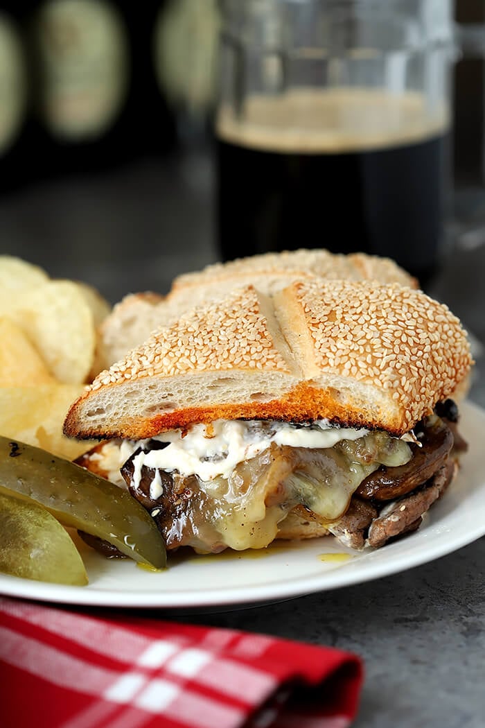 Steak and Cheese Sandwich with Caramelized Onions and Mushrooms with Horseradish Mayonnaise