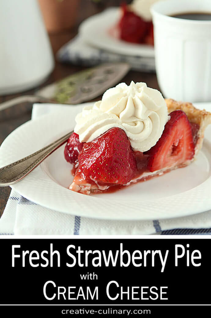 Fresh Strawberry Pie with Cream Cheese topped with whipped cream and served on a white plate.