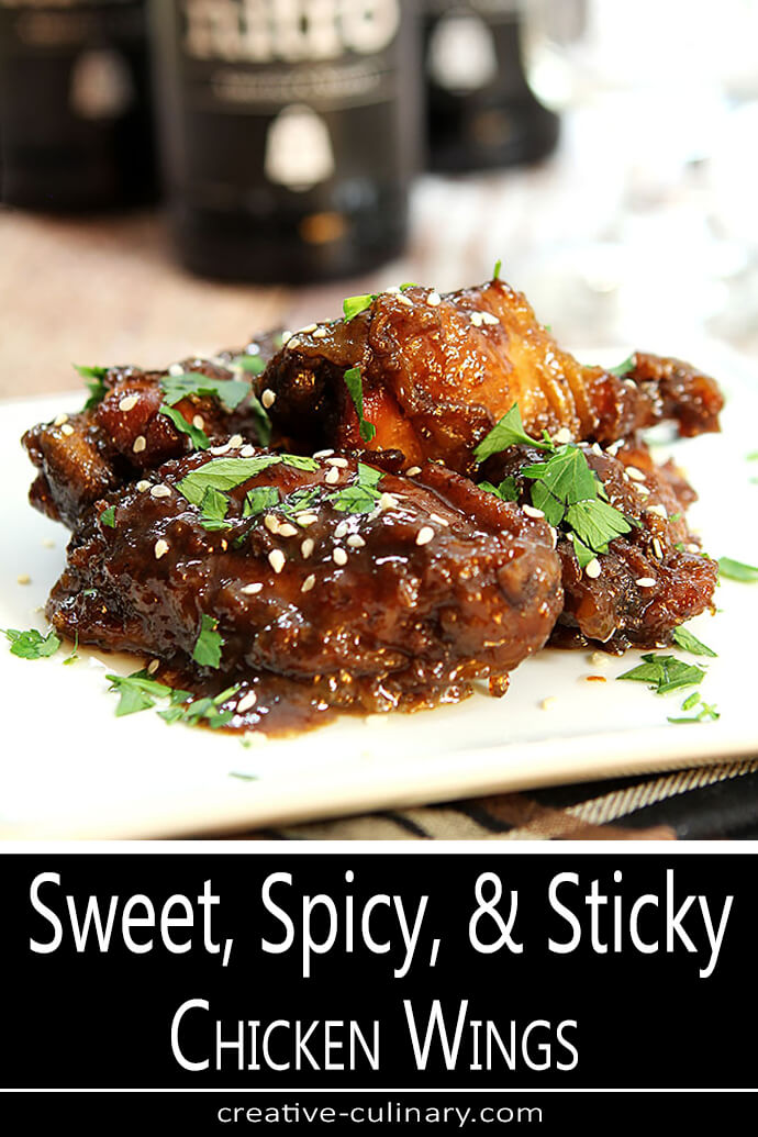 Sweey, Spicy, and Sticky Chicken Wings Appetizer Served on a Square Plate