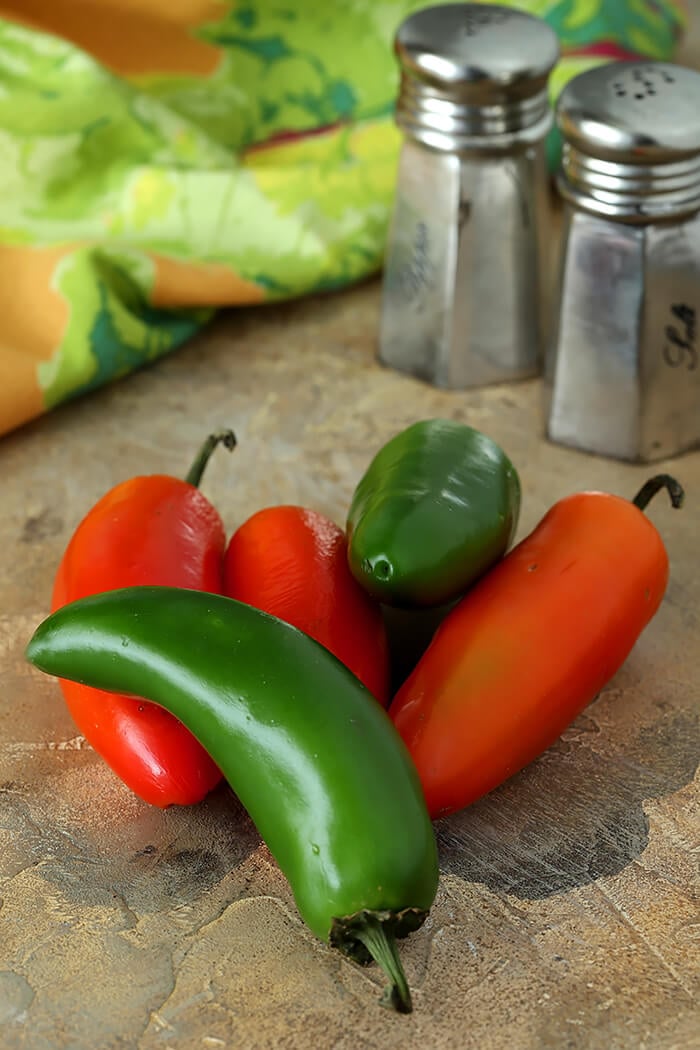 Red and Green Jalapenos on Tabletop